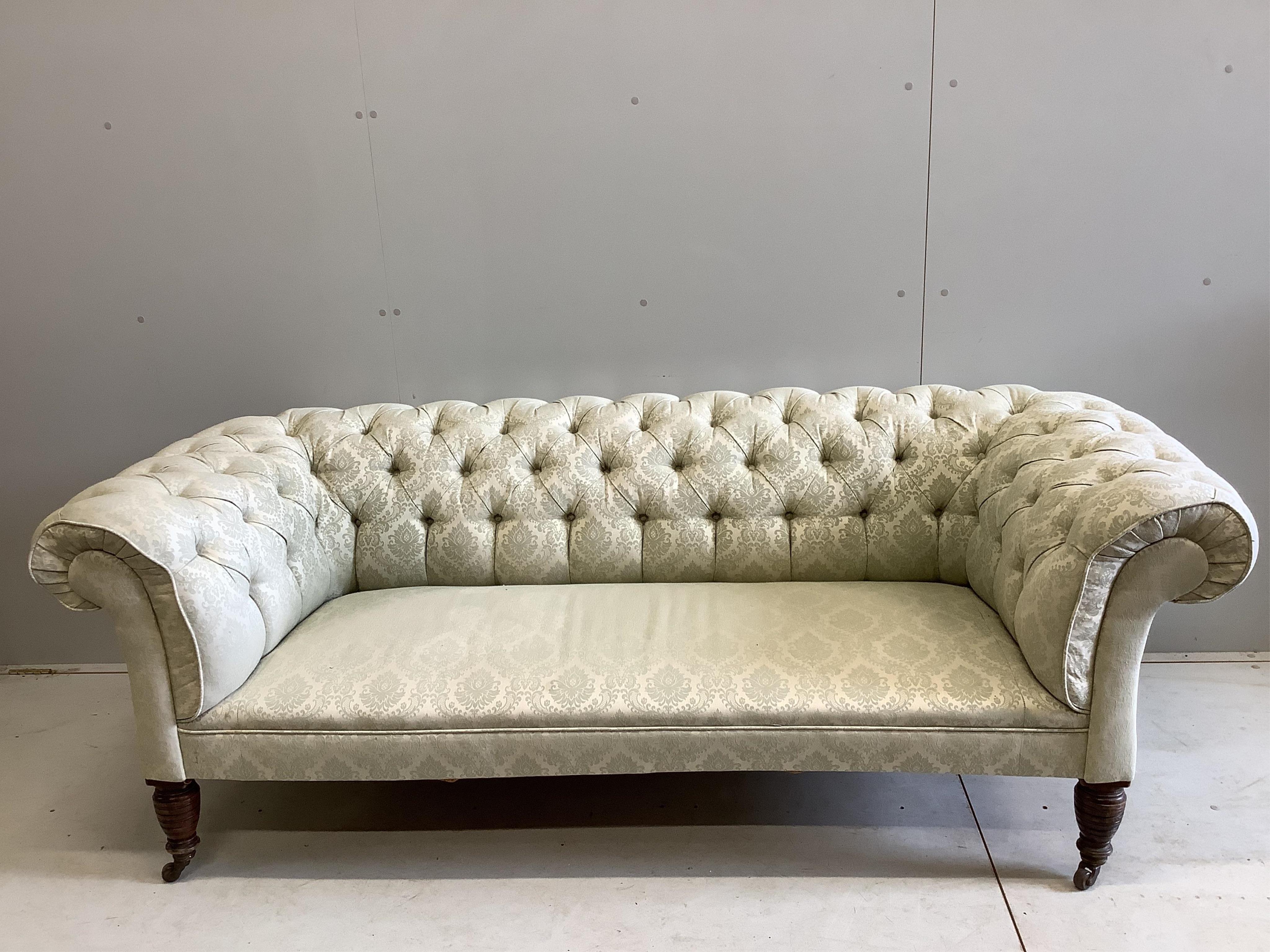 A late Victorian Chesterfield settee, width 196cm, depth 83cm, height 72cm. Condition - fair